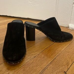 Black suede heels with silver embellishments